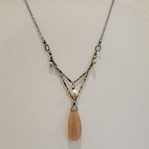 Amy Olson necklace with Sunstone, Seed Pearls, and brass links on goldfill chain